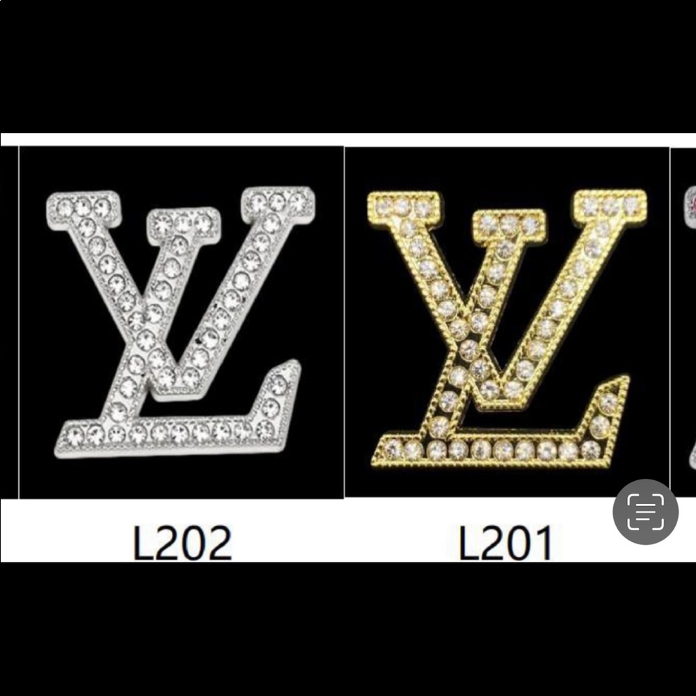 3 Silver LV charms, 3 Silver Gucci Arrow Charms, 2 Channel Silver Charms. $20